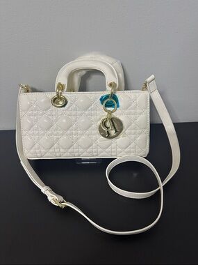 White Patent Leather Lady Dior replica  Mini Crossbody. Missing “I” on Charm.